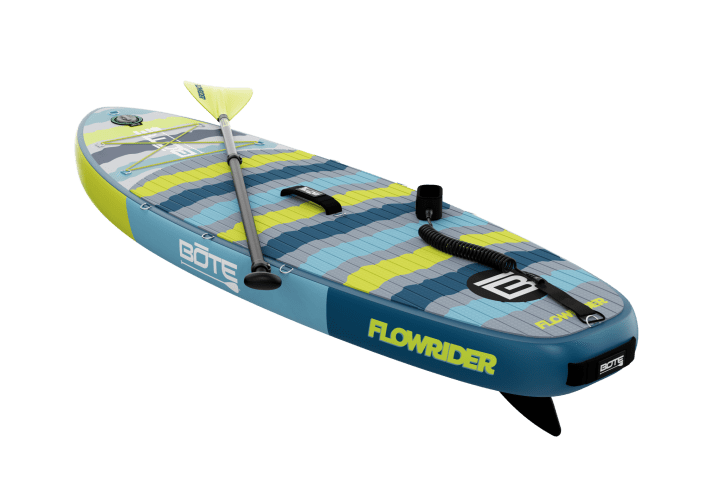 Inflatable paddleboard with paddle and pump, branded BOTE Flowrider.