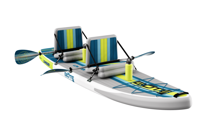 Inflatable kayak with two seats and paddles.